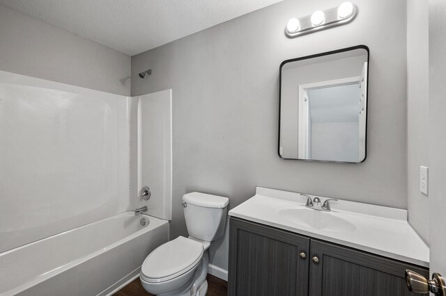 1415 Galtier St, Saint Paul, MN 55117 - full bath featuring vanity, toilet, shower / bathtub combination, and a textured ceiling