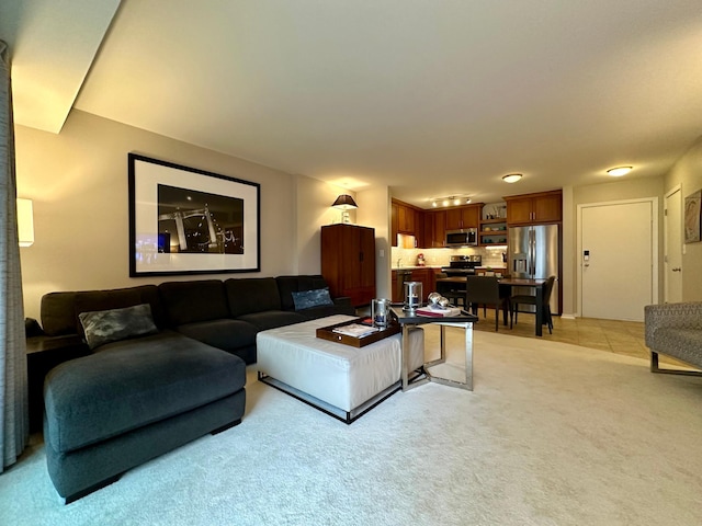 living room featuring light colored carpet