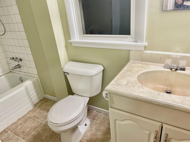 full bathroom with vanity, toilet, and tiled shower / bath combo