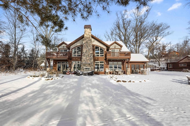 view of snow covered house