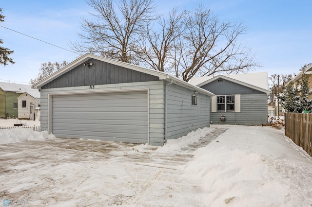 view of snow covered garage