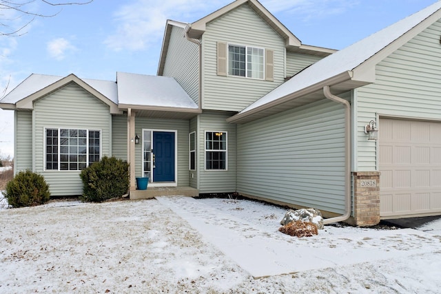 front facade with a garage