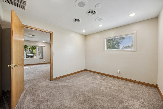 view of carpeted spare room