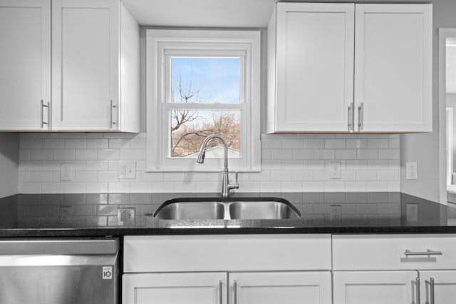 kitchen featuring white cabinetry and stainless steel dishwasher