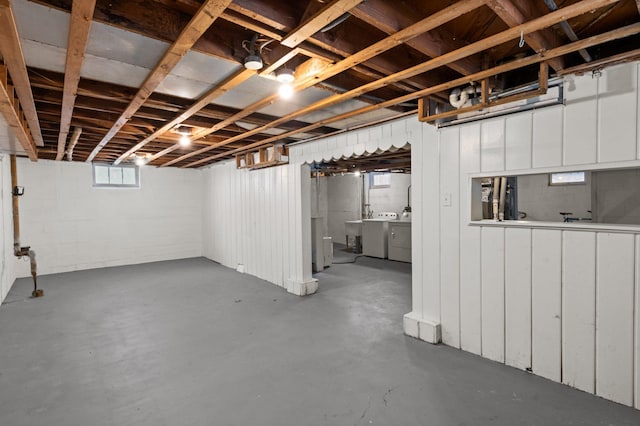 basement featuring separate washer and dryer