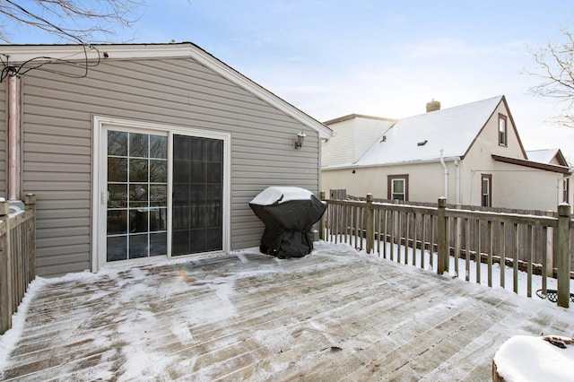 view of snow covered deck