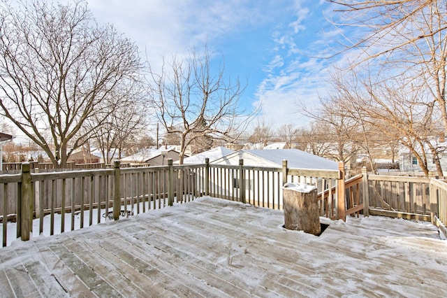 view of snow covered deck