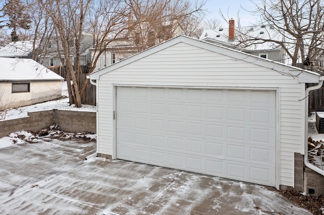 view of snow covered garage