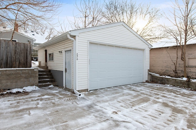 view of snow covered garage