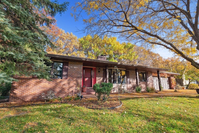 view of front of home with a front lawn