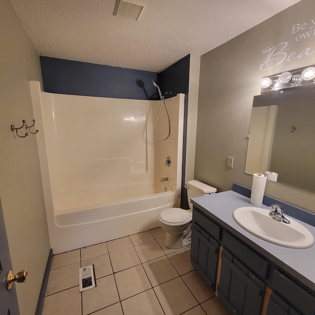 full bathroom with tile patterned floors, tub / shower combination, vanity, a textured ceiling, and toilet