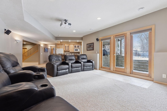 cinema room with light carpet