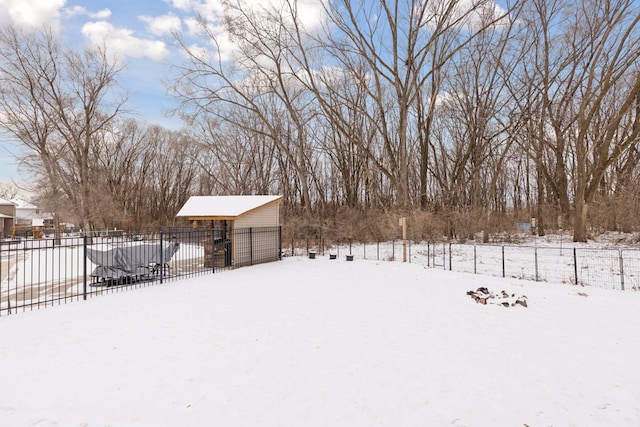 view of yard covered in snow