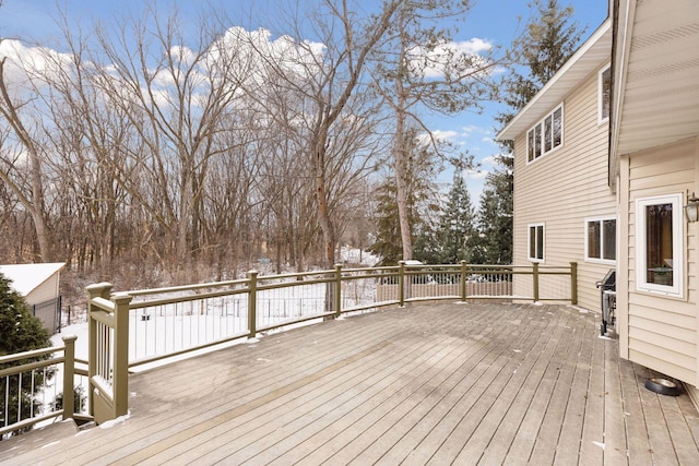 view of snow covered deck