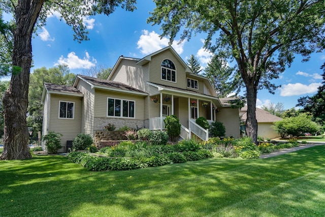 5061 Oxbow Pl, Champlin, MN 55316 - view of front of home with a front yard and a porch