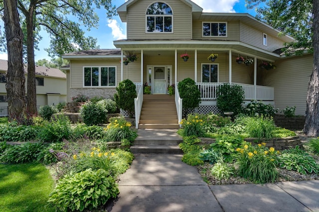 5061 Oxbow Pl, Champlin, MN 55316 - view of front of house featuring a porch and brick siding