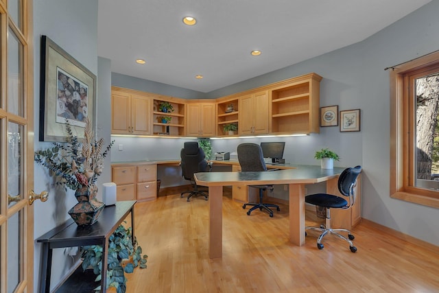5061 Oxbow Pl, Champlin, MN 55316 - home office with built in desk, light wood-style flooring, and recessed lighting