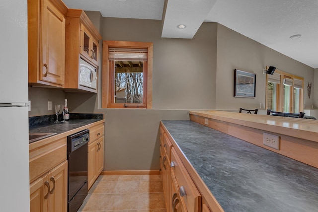 5061 Oxbow Pl, Champlin, MN 55316 - kitchen with black dishwasher, dark countertops, freestanding refrigerator, glass insert cabinets, and recessed lighting