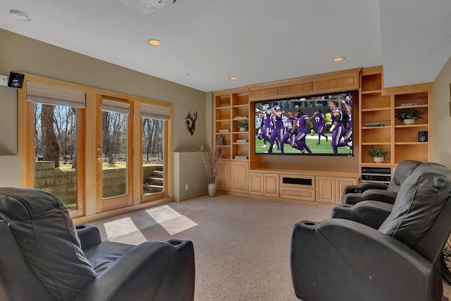 5061 Oxbow Pl, Champlin, MN 55316 - cinema featuring light colored carpet, built in shelves, and recessed lighting