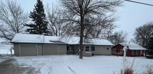 ranch-style home with a garage