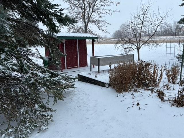 view of yard covered in snow