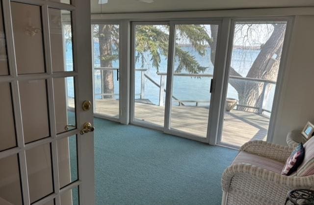 doorway featuring carpet