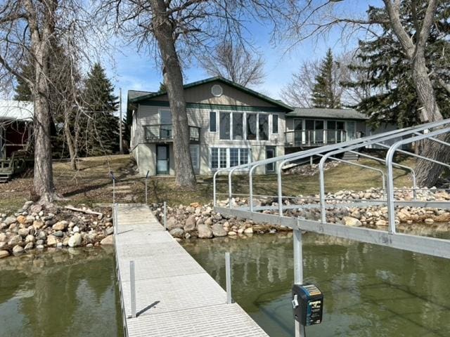 dock area featuring a water view