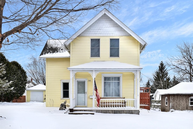 view of front of house with an outbuilding and a garage