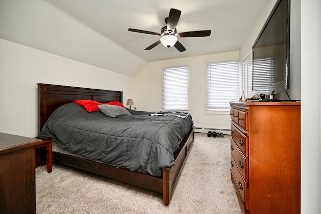 carpeted bedroom featuring ceiling fan, a baseboard radiator, and vaulted ceiling