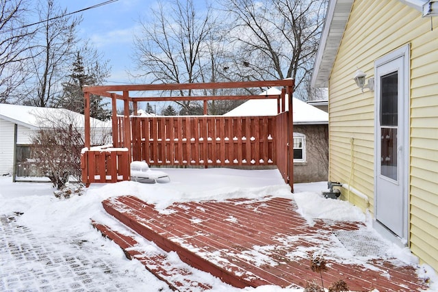 view of snow covered deck