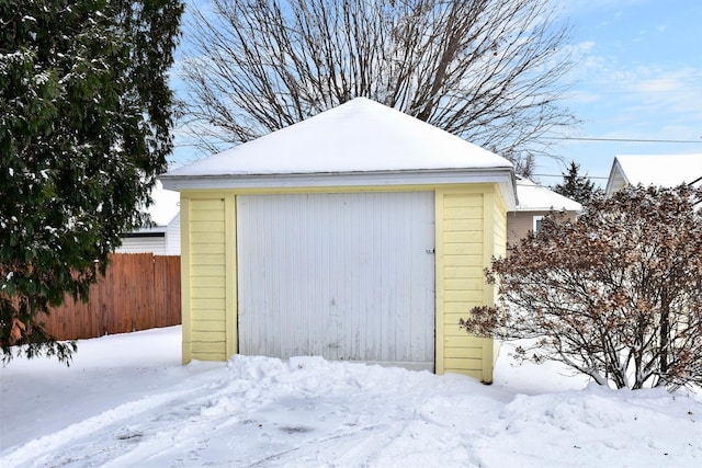 view of snow covered garage