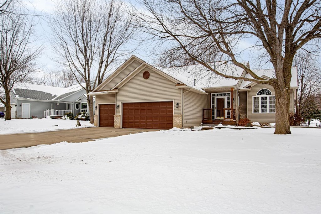 ranch-style home with a garage