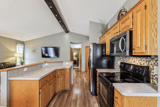 kitchen with vaulted ceiling with beams, black electric range oven, dark hardwood / wood-style floors, a textured ceiling, and decorative backsplash