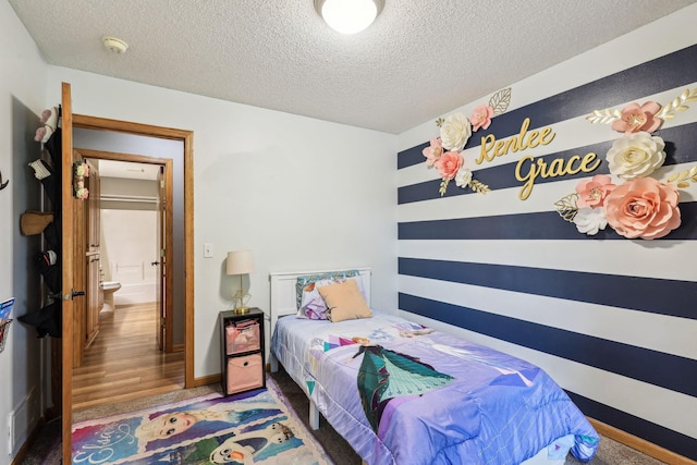 bedroom featuring a textured ceiling