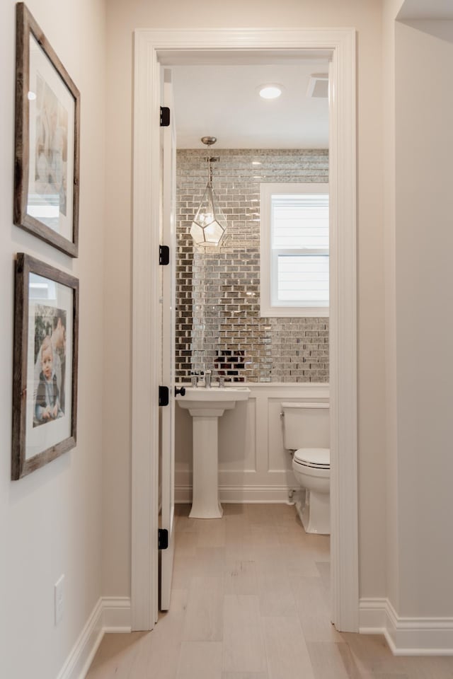 bathroom with tile patterned floors and toilet