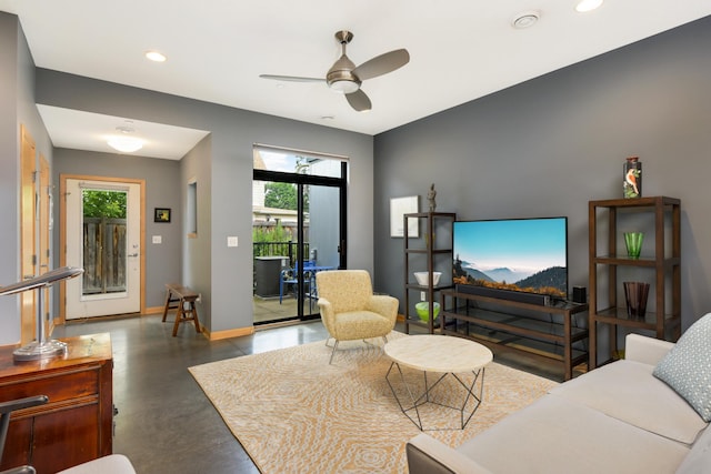 living room with ceiling fan