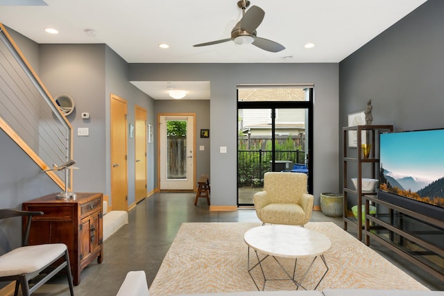 living room featuring ceiling fan