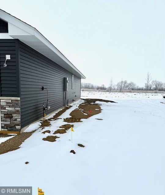 view of snow covered property