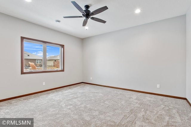 carpeted empty room featuring recessed lighting, baseboards, and ceiling fan