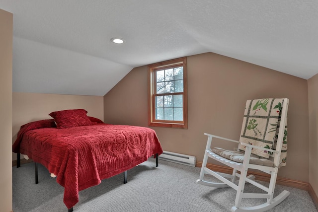 carpeted bedroom featuring a baseboard radiator, vaulted ceiling, and a textured ceiling