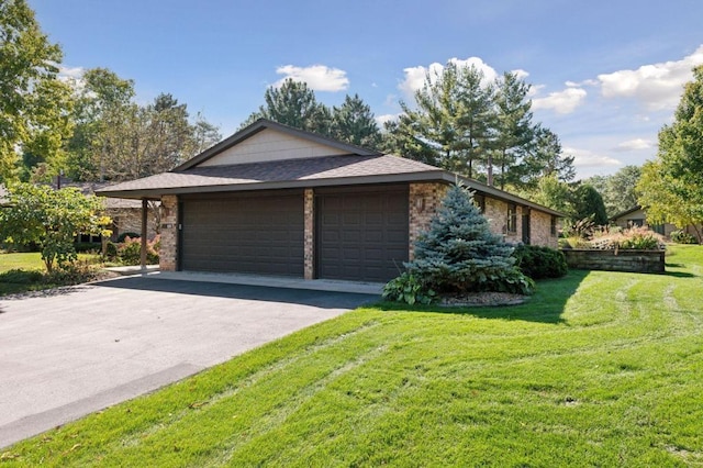 view of property exterior with a garage and a lawn