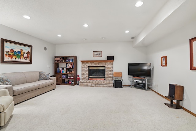 carpeted living area with baseboards, a fireplace, recessed lighting, and visible vents