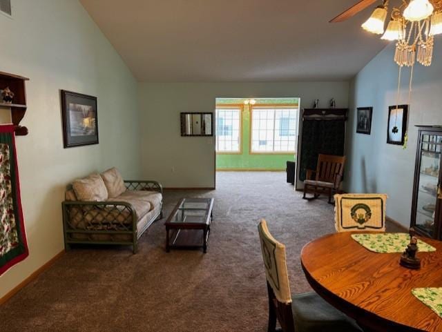 living room with carpet flooring, ceiling fan, and lofted ceiling