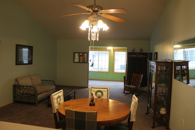 dining room featuring carpet, high vaulted ceiling, ceiling fan, and a healthy amount of sunlight