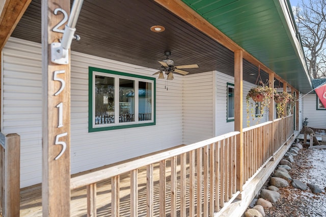 view of side of property with ceiling fan