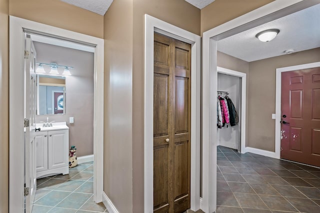 interior space with a textured ceiling