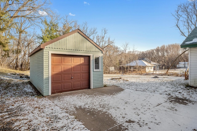 view of snow covered garage