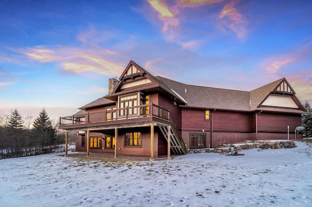 view of front of property with a wooden deck