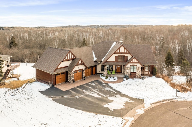 tudor home featuring a garage