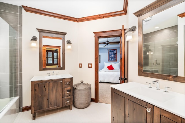 bathroom featuring vanity, ceiling fan, and crown molding